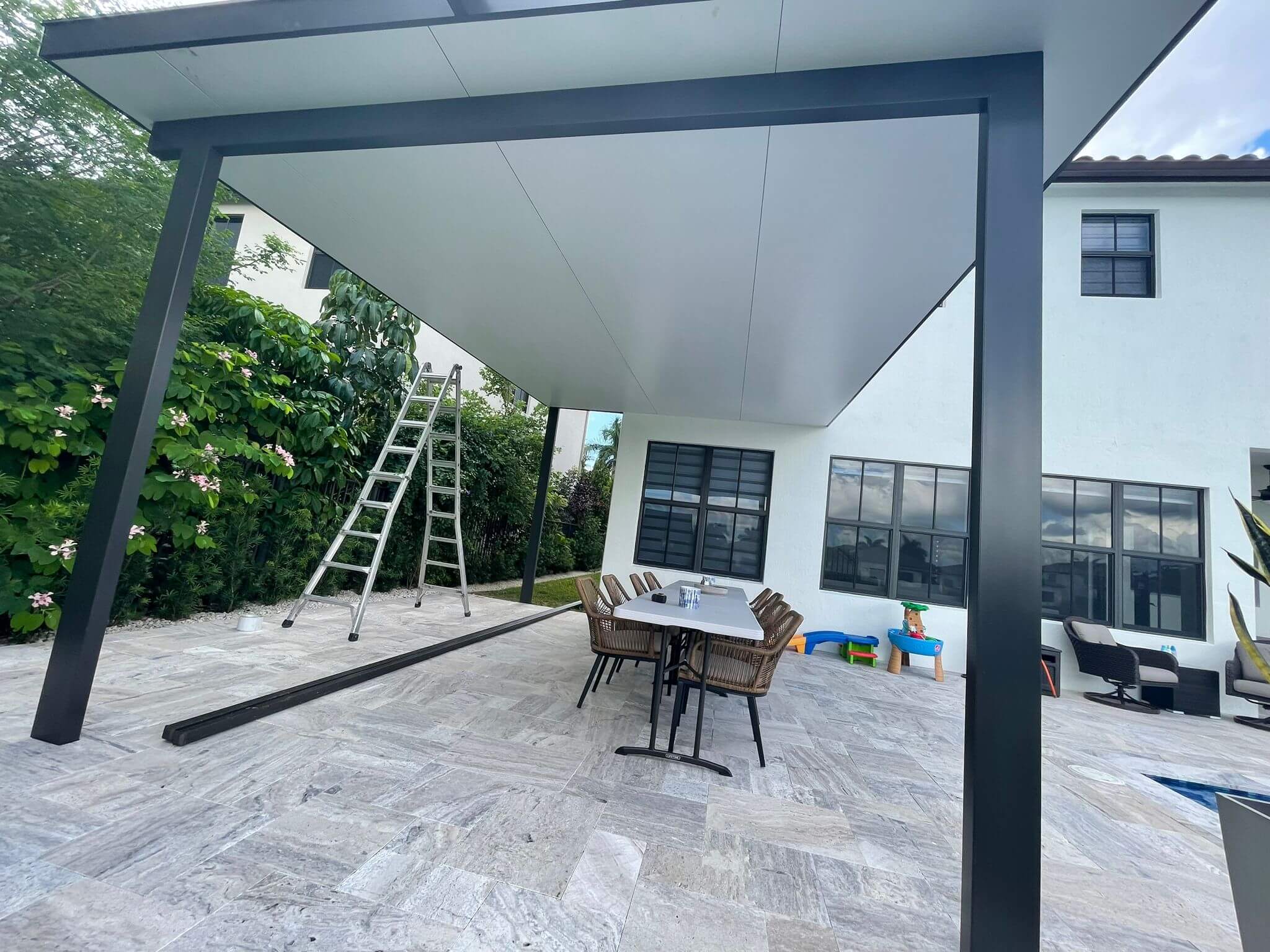 Insulated aluminum pergola with ceiling fan in Lake Nona FL